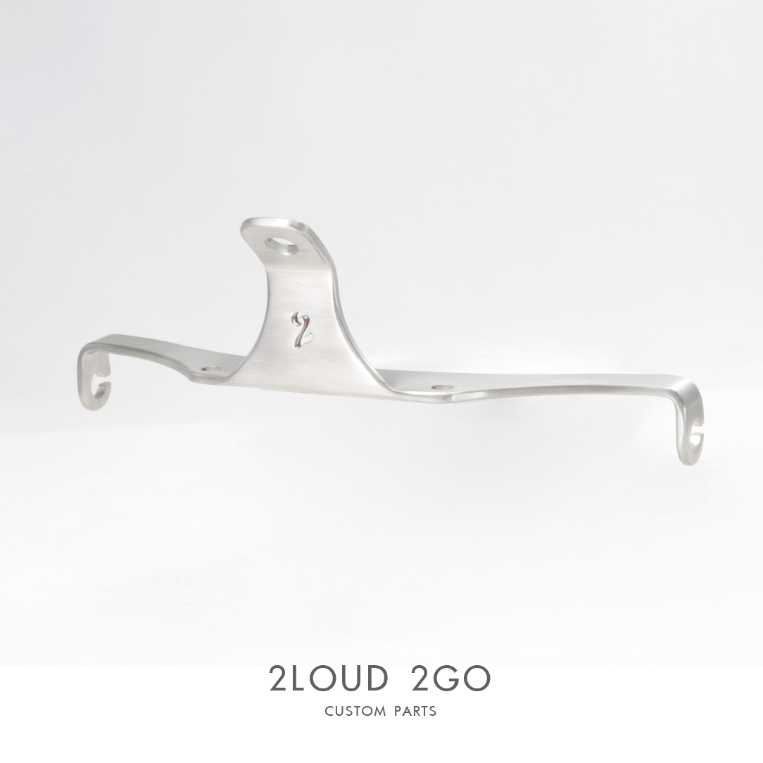 SUZUKI TU250 HEADLIGHT INCLUDING DIRECTION LIGHT BRACKET