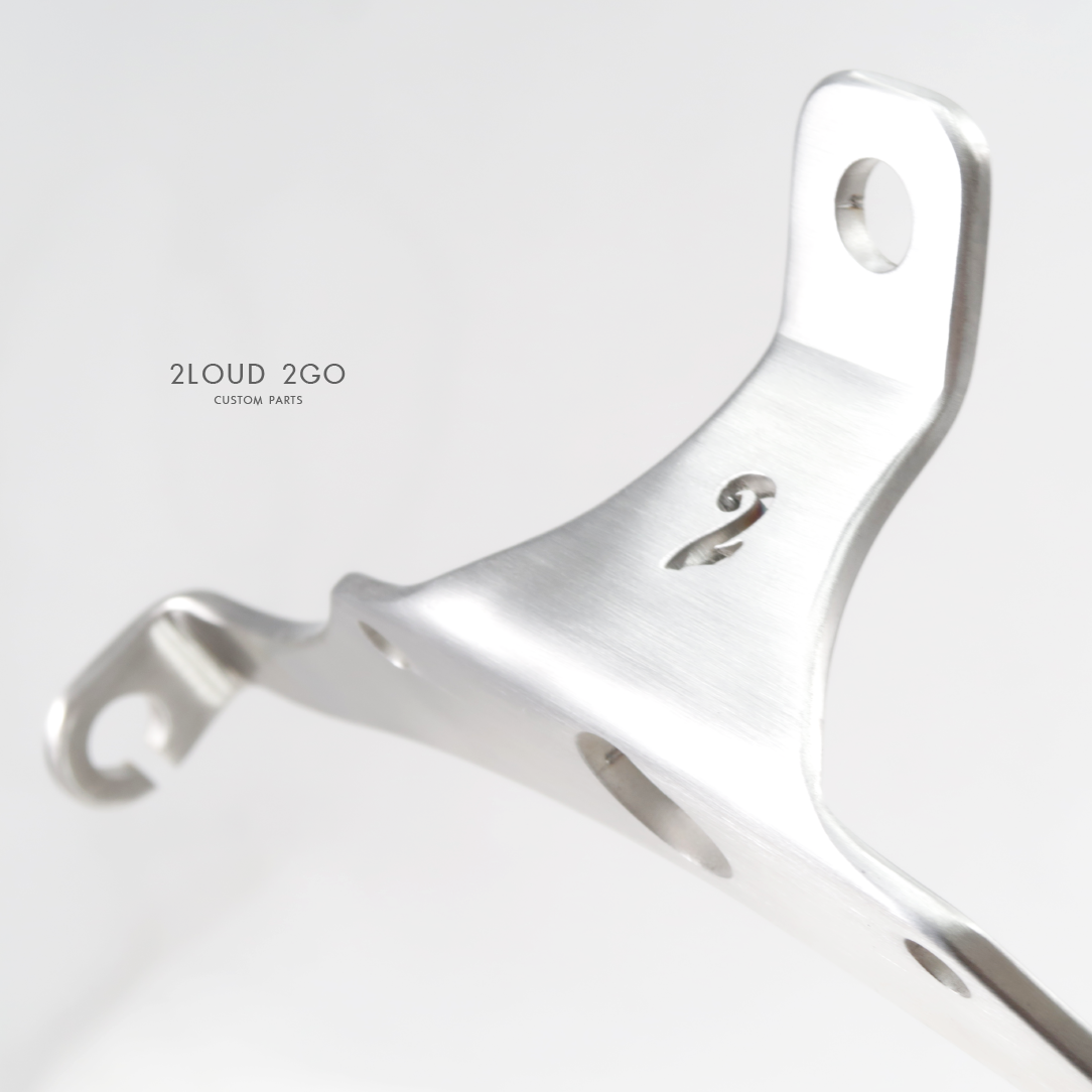 SUZUKI TU250 HEADLIGHT INCLUDING DIRECTION LIGHT BRACKET