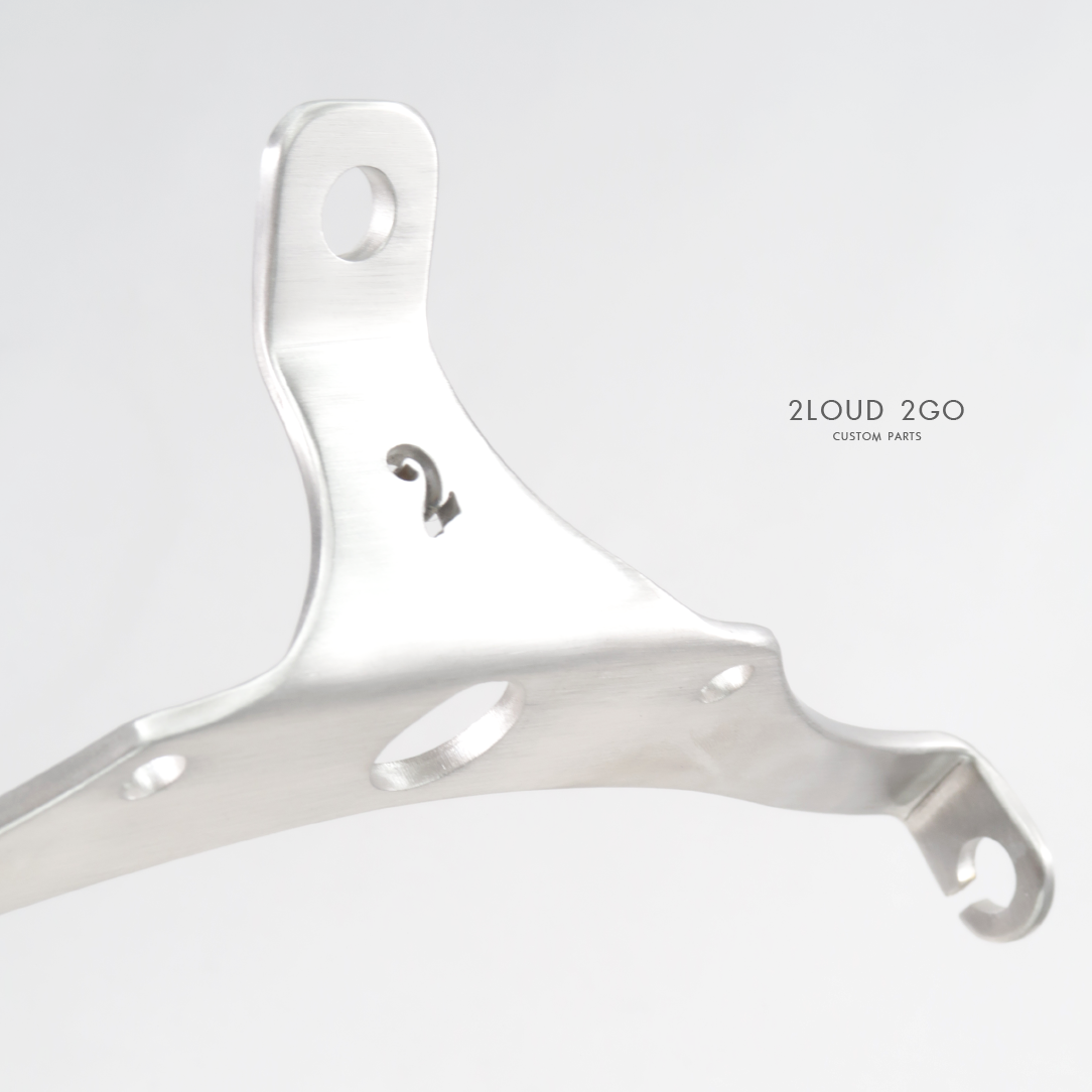 SUZUKI TU250 HEADLIGHT INCLUDING DIRECTION LIGHT BRACKET